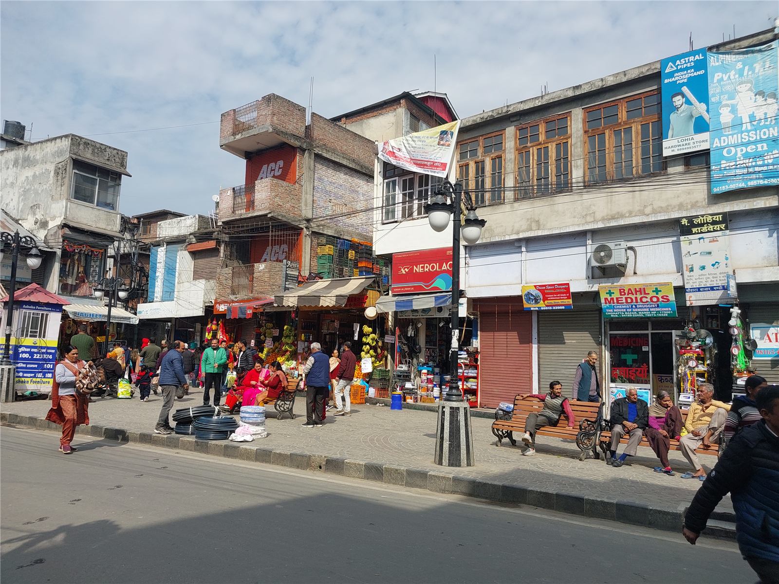 A busy market street in a Himachal town